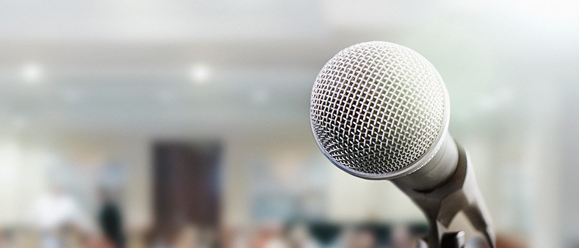 Microphone in front of a crowd