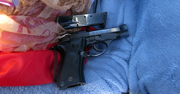 Confiscated handgun and magazine