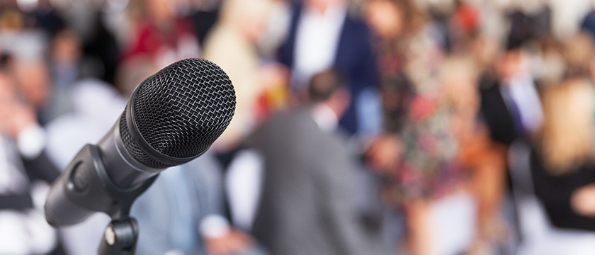 Microphone in front of a crowd