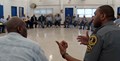 Virginia State Police officer speaks to offenders at State Farm Correctional Center